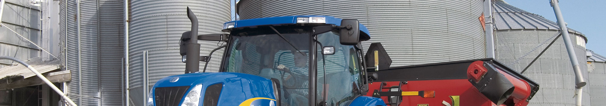 New Holland tractor and grain cart